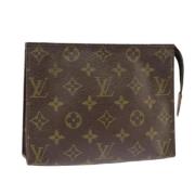 Pre-owned Canvas pouches Louis Vuitton Vintage , Brown , Dames