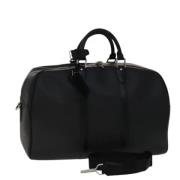 Pre-owned Leather travel-bags Louis Vuitton Vintage , Black , Dames