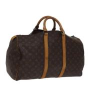 Pre-owned Canvas travel-bags Louis Vuitton Vintage , Brown , Dames