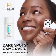 L'Oréal Paris Bright Reveal Dark Spot UV Fluid SPF 50+ with Niacinamid...