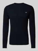 Gebreide pullover met kabelpatroon