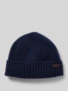 'Beanie met labelbadge