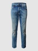 Slim fit jeans met knoop- en ritssluiting