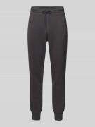 Tapered fit sweatpants met labelprint