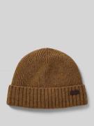 'Beanie met labelbadge