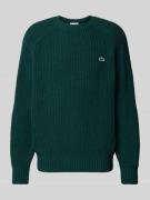 Gebreide pullover van wol met logopatch, model 'BEADED'