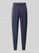 Relaxed fit sweatpants met achterzak