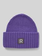 'Beanie met labelbadge