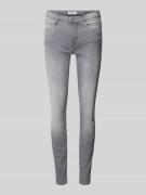 Slim fit mid rise jeans met stretch, model 'Alva'