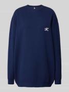 Oversized gebreide pullover met labelstitching