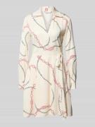 Mini-wikkeljurk met motiefprint