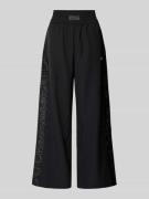 Wide leg trackpants met galonstrepen