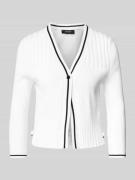 Gebreid jack met knoopsluiting.