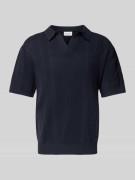 Oversized poloshirt met V-hals