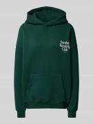 Oversized hoodie met statementprint, model 'Sunday Running Club'