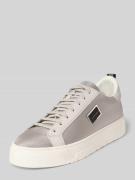 Leren sneakers met labelapplicatie