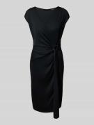Knielange jurk in wikkellook, model 'Gervas'