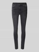 High waist jeans met achterzakken