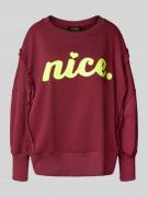 Relaxed fit sweatshirt met statementprint en ronde hals