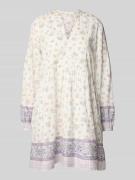 Uitlopende vrijetijdsjurk met all-over motief