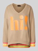 Sweatshirt met statementprint en V-hals