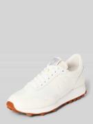 Sneakers van een mix van leer en textiel met labeldetail