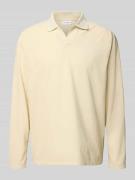 Oversized poloshirt met structuurmotief