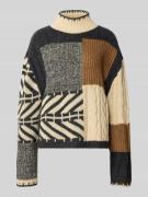 Gebreide pullover met kabelpatroon