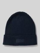 Gebreide muts met kasjmier en labelpatch