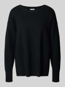 Gebreide pullover met zijsplitten