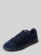Sneakers met labeldetails