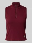 Top met opstaande kraag en ritssluiting