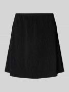 Uitlopende minirok van crêpe afwerking, model 'FLORA'