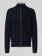 Gebreid jack van scheerwol met tweewegsritssluiting