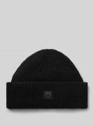 Muts van echt lamswol. model 'Low'