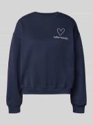 Oversized sweatshirt met labelstitching, model 'Sydney'