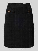 Knielange rok in bouclélook