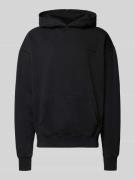 Oversized hoodie met logo en kangoeroezak