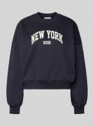 Sweatshirt met labelprint en ronde hals