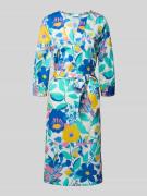 Knielange jurk met strikceintuur