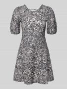 Licht uitlopende mini-jurk met rugdecolleté, model 'SURI'