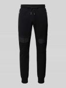 Slim fit sweatpants met achterzakken