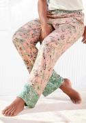 NU 20% KORTING: Lascana Pyjamabroek in bloemen print all-over