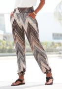 Lascana Jerseybroek met all-over print en zakken, elastische tailleban...
