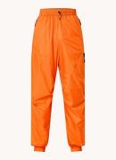 The North Face TNF x Yinka Ilori tapered fit broek met ritszakken en l...